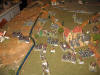 The 2/138e Ligne charges Polnitz while the two flanking battalions advance on the far bank of the stream.