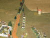 The wagon train follow its slow retreat over the muddy road